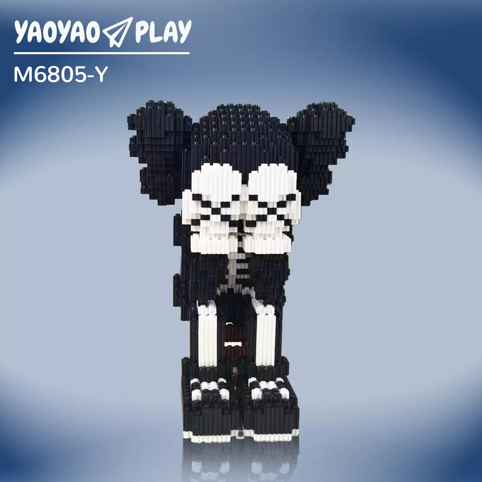 Black-and-white Brick Bear toy with pixelated patterns on a reflective surface and gradient blue backdrop.